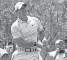  ?? DEDMON/USA TODAY SPORTS ?? Rory McIlroy watches his tee shot on the second hole during the final round of the Wells Fargo Championsh­ip on Sunday. McIlroy beat Abraham Ancer by one shot to win the event. JIM