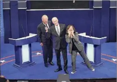  ?? Will Heath / Associated Press ?? Alec Baldwin as Donald Trump, left, Jim Carrey as Joe Biden and Maya Rudolph as Kamala Harris star in the "First Debate" Cold Open on "Saturday Night Live" last week.