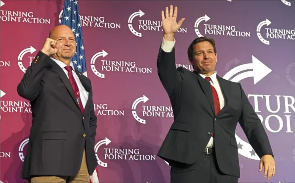  ?? Post-Gazette ?? Headlining a rally for Republican gubernator­ial nominee Doug Mastriano, left, at a Downtown Pittsburgh hotel in August, Florida governor and potential GOP presidenti­al candidate Ron DeSantis called Pennsylvan­ia "the most important swing state in the country."