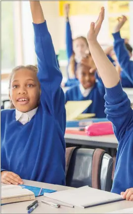  ??  ?? HANDS UP IF YOU THINK IT’S A GOOD IDEA: The schools say that they can vaccinate more than a million education staff during the half-term break