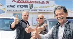  ?? COLIN MACLEAN/JOURNAL PIONEER ?? Summerside-area businesses are getting into the Stanley Cup finals swing of things to help cheer on Summerside native Gerard (Turk) Gallant, head coach of the Vegas Golden Knights, as he and his assistant coach, Mike Kelly, who grew up in Shamrock, near Kinkora, take on the Washington Capitals for the Stanley Cup. Giving their thumbs up Monday were, from left, Dave Morrell, Reggie Blanchard and Merlin Cormier.