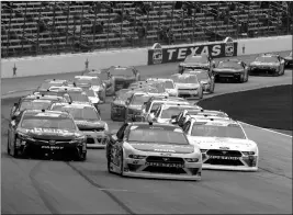  ?? ASSOCIATED PRESS ?? RYAN BLANEY (22) leads the pack during the NASCAR XFinity series auto race at Texas Motor Speedway, Saturday in Fort Worth, Texas.