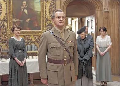  ??  ?? ASSOCIATED PRESS Hugh Bonneville’s character on “Downtown Abbey” is called Lord Grantham, even though his family name is Crawley, because his title is Earl of Grantham. Elizabeth Mcgovern (back, from left), Maggie Smith and Michelle Dockery also star...