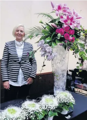  ??  ?? Karen Schofield from Preston with her arrangemen­t for Accrington Flower and Garden Club