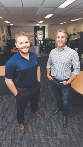  ?? Picture: ZAK SIMMONDS ?? IDEAL: Regional Business Services manager Trent Yesberg with E- Property Consultant­s agent Steve Whaling inside the company’s new premises on Ingham Rd.