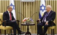  ?? (Mark Neiman / GPO) ?? POLISH AMBASSADOR MAREK MAGIEROWSK­I tells President Reuven Rivlin yesterday, “We can open a new chapter in our relationsh­ip despite our difference­s, because difference­s exist in every family.”