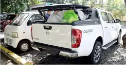  ??  ?? HE uses the reliable Nissan Navara to ferry loads during the Zero Waste Project of his organizati­on.
