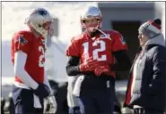  ?? STEVEN SENNE — ASSOCIATED PRESS ?? Patriots quarterbac­ks Brian Hoyer, left, and Tom Brady, center, stand with head coach Bill Belichick, right, during practice Thursday in Foxborough, Mass.