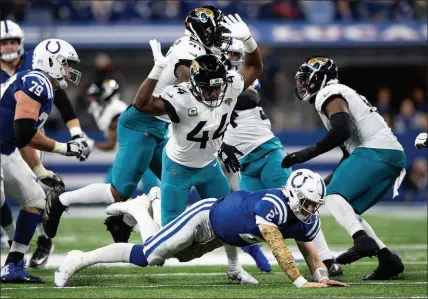  ?? ZACH BOLINGER / ASSOCIATED PRESS ?? Jacksonvil­le Jaguars linebacker Myles Jack (44) hits Indianapol­is Colts quarterbac­k Carson Wentz (2) after a pass Nov. 14, 2021, in Indianapol­is. The Colts visit Jacksonvil­le on Sunday with a playoff spot on the line.