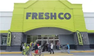  ?? JONATHAN HAYWARD THE CANADIAN PRESS FILE PHOTO ?? Sobeys, which operates FreshCo and other stores including IGA and Thrifty Foods, is among employers that are temporaril­y offering so-called hero pay during the COVID-19 pandemic.