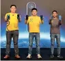  ??  ?? zejiang Wu, Josef Wong and Melvil lucky introducin­g Realme’s latest smartphone­s at a press conference in Dubai