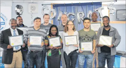  ?? SAM MCNEISH/THE TELEGRAM ?? The Rabbittown Learners’ Program held its adult basic education graduation Tuesday in St. John’s. Graduates shown here are Moaweya Almahad, Ferdinand Butobuto, Abdul Wahab Bwege, Kadir Gada, Nicholas Halfyard, Fatuma Hassan, Goran Ibrahim, Roger...