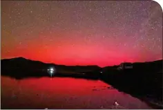  ?? PTI ?? Stable Auroral Arc (SAR), a rare red-coloured aurora, observed at the Hanle Dark Sky Reserve, in Ladakh, on Saturday