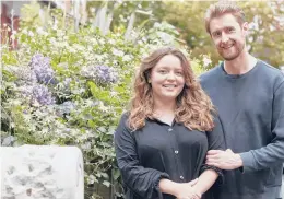  ?? ANDY HASLAM/THE NEW YORK TIMES ?? Skylor Bee-Latty and her boyfriend, Alex Camp, outside the Manchester, England, property where they were quarantine­d.