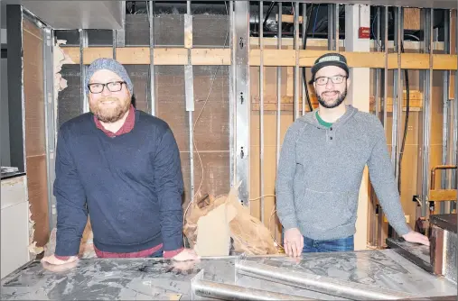  ?? TERRENCE MCEACHERN/THE GUARDIAN ?? Upstreet Craft Brewing co-owners Mitch Cobb, left, and Mike Hogan, are getting set for the craft brewery’s new retail location in the former Starbucks space at the corner of Great George and Kent streets.