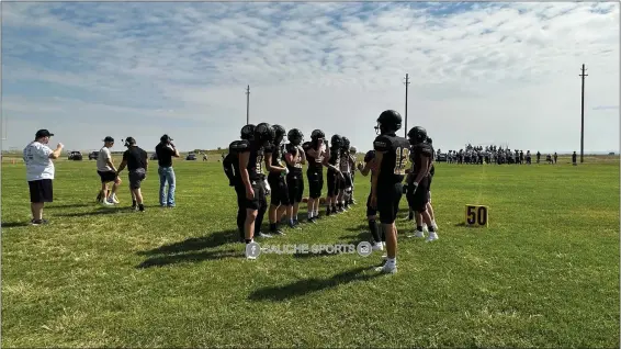  ?? COURTESY PHOTO — CALICHE SPORTS FACEBOOK PAGE ?? The 2023Calich­e High School football team huddles before a game.