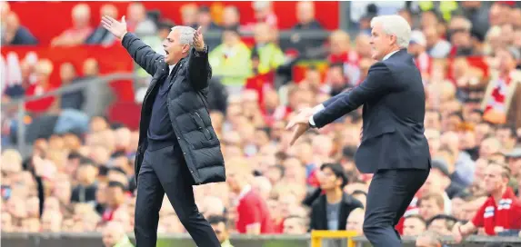  ?? Picture: Richard Heathcote/Getty ?? Manchester United manager Jose Mourinho, left, and former Southampto­n boss Mark Hughes feel the pressure