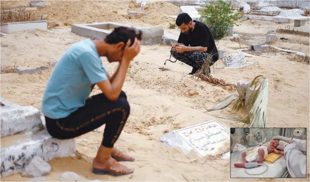  ?? Reuters ?? ↑ Sabreen Al Rouh (inset)’s uncle (R) crouches next to her grave in Rafah in the southern Gaza Strip on Friday.