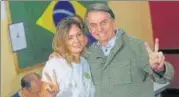  ?? REUTERS ?? Jair Bolsonaro with his wife Michelle in Rio de Janeiro.