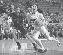  ?? PATRICK BREEN/THE REPUBLIC ?? Valley Vista’s Olivia Arvallo drives against Perry’s Jayla Cal during the Class 6A state championsh­ip game last season.
