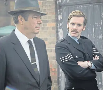  ??  ?? Shaun, complete with new ’tache, alongside Roger Allam in Endeavour.