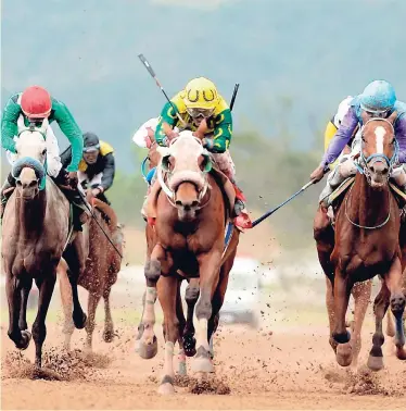  ?? FILE ?? Dontae (centre), ridden by Anthony Thomas, leaves the rest of the pack behind to win the fifth race at Caymanas Park on March 17, 2018.