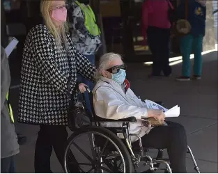  ?? COUNTY MEDICAL RESERVE CORPS ?? Many of the people who received dozes of the Moderna vaccine at Upper Darby High School last month required the assistance of wheelchair­s.