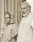  ?? HT PHOTO ?? Prime Minister Narendra Modi with Bangladesh PM Sheikh Hasina