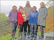  ??  ?? Kerrera residents with Roseanna Cunningham, right, during her ministeria­l visit to the old school.