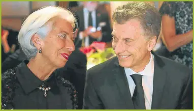  ?? NA ?? PASARON COSAS. Macri y Lagarde juntos. El fútbol no sería parte de los acuerdos firmados con el FMI.