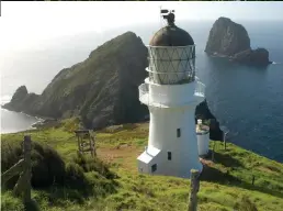  ??  ?? NEW ZEALAND DEPARTMENT OF CONSERVATI­ON
Dating to 1908, the Cape Brett Hut was originally the lighthouse keeper’s cottage.