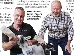  ??  ?? KIDS Robert & David – Roger’s sons – feeding young goats