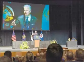  ?? Jacquelyn Martin Associated Press ?? PRESIDENT BIDEN speaks at the memorial service for former Vice President Walter Mondale on Sunday at the University of Minnesota in Minneapoli­s.