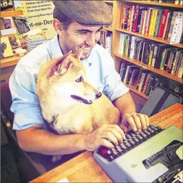  ?? CONTRIBUTE­D ?? Poet Brian Sonia-Wallace, who said he still has lots of people ask him to compose lines about their dogs, also still uses a typewriter. During his Mall of America residency this month, he plans to pound out 125 poems on a 100-year-old folding Corona...