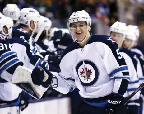  ?? RICHARD LAUTENS/TORONTO STAR ?? The Winnipeg Jets and centre Mark Scheifele, who lead the Western Conference, have not lost two games in a row in regulation time since early October.