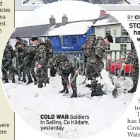  ??  ?? COLD WAR Soldiers in Sallins, Co Kildare, yesterday