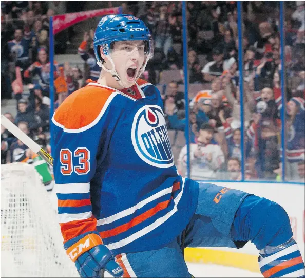  ?? — GETTY IMAGES FILES ?? The table is set for new Oilers coach Todd McLellan with junior star Connor McDavid coming in to push Burnaby native Ryan Nugent-Hopkins, above, and Edmonton’s other promising young players. It’s conceivabl­e that the Canucks could have another division...