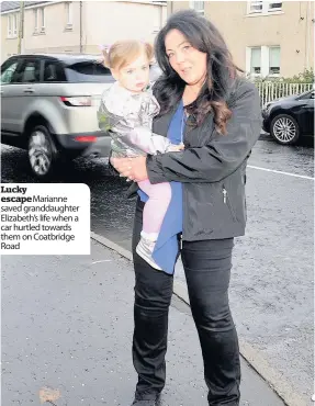  ??  ?? Lucky escape Marianne saved granddaugh­ter Elizabeth’s life when a car hurtled towards them on Coatbridge Road