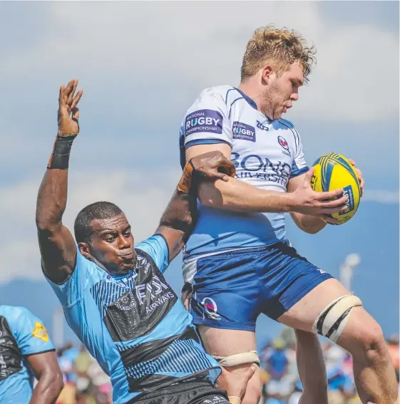  ?? Picture: QRU MEDIA UNIT/BRENDAN HERTEL ?? Angus Scott-Young leaps highest for Queensland Country during their impressive victory in Fiji.