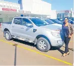  ?? Picture: SUPPLIED ?? Sales consultant Priya Prasad with pre used Ford Ranger 3.2L XLT Twincab.