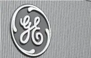  ?? [AP FILE PHOTO] ?? GE said Thursday that it will cut 12,000 jobs in its power division as alternativ­e energy supplants demand for coal and other fossil fuels.