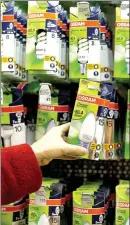  ?? PROVIDED TO CHINA DAILY ?? Osram Licht AG’s light bulbs are seen on shelves of a supermarke­t in Guangzhou, Guangdong province.