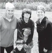  ?? PHOTO COURTESY OF THERESA ROHRS ?? Christy Borck, who was shot in August, is recovering quickly, fueled by the support of her mother, Theresa Rohrs. The mother-daughter pair are pictured with Borck’s children, Kira, Sanibel and Liam.