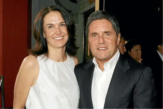  ?? GETTY IMAGES ?? Jill Messick, pictured here with former Paramount Pictures chief executive Brad Grey, faced ‘‘slanderous’’ claims from her former client Rose McGowan, her family says.