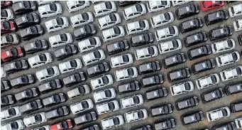  ?? ?? ELECTRIC cars are seen at a parking lot of a car factory in Xingtai, Hebei province, China. This year, statistics indicate electric car sales could reach new highs yet again, with 2 million sold in the first quarter of the year alone – a 75% increase from the same period in 2021, the writer says. | Reuters