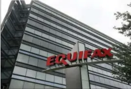  ?? MIKE STEWART — THE ASSOCIATED PRESS ?? This photo shows Equifax Inc., offices in Atlanta. Credit monitoring company Equifax says a breach exposed social security numbers and other data from about 143 million Americans. The Atlanta-based company said Thursday that “criminals” exploited a...