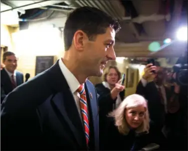  ?? Associated Press ?? Rep. Paul Ryan, R-Wis. arrives for a House GOP meeting on Capitol Hill in Washington Oct. 9. The pressure is on Ryan to run for House speaker in the chaotic aftermath of Majority Leader Kevin McCarthy’s decision to abandon his campaign for the post.