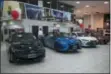  ?? JAE C. HONG — THE ASSOCIATED PRESS ?? Toyota sedans are displayed in a showroom at Puente Hills Toyota Thursday in Industry, Calif.