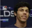  ?? Morry Gash ?? The Associated Press Right fielder Christian Yelich led the Brewers with a .326 batting average, 36 home runs and 110 RBIS.