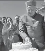  ??  ?? Himachal chief minister Virbhadra Singh cutting the cake on his 84th birthday at his residence in Shimla on Friday. DEEPAK SANSTA/HT